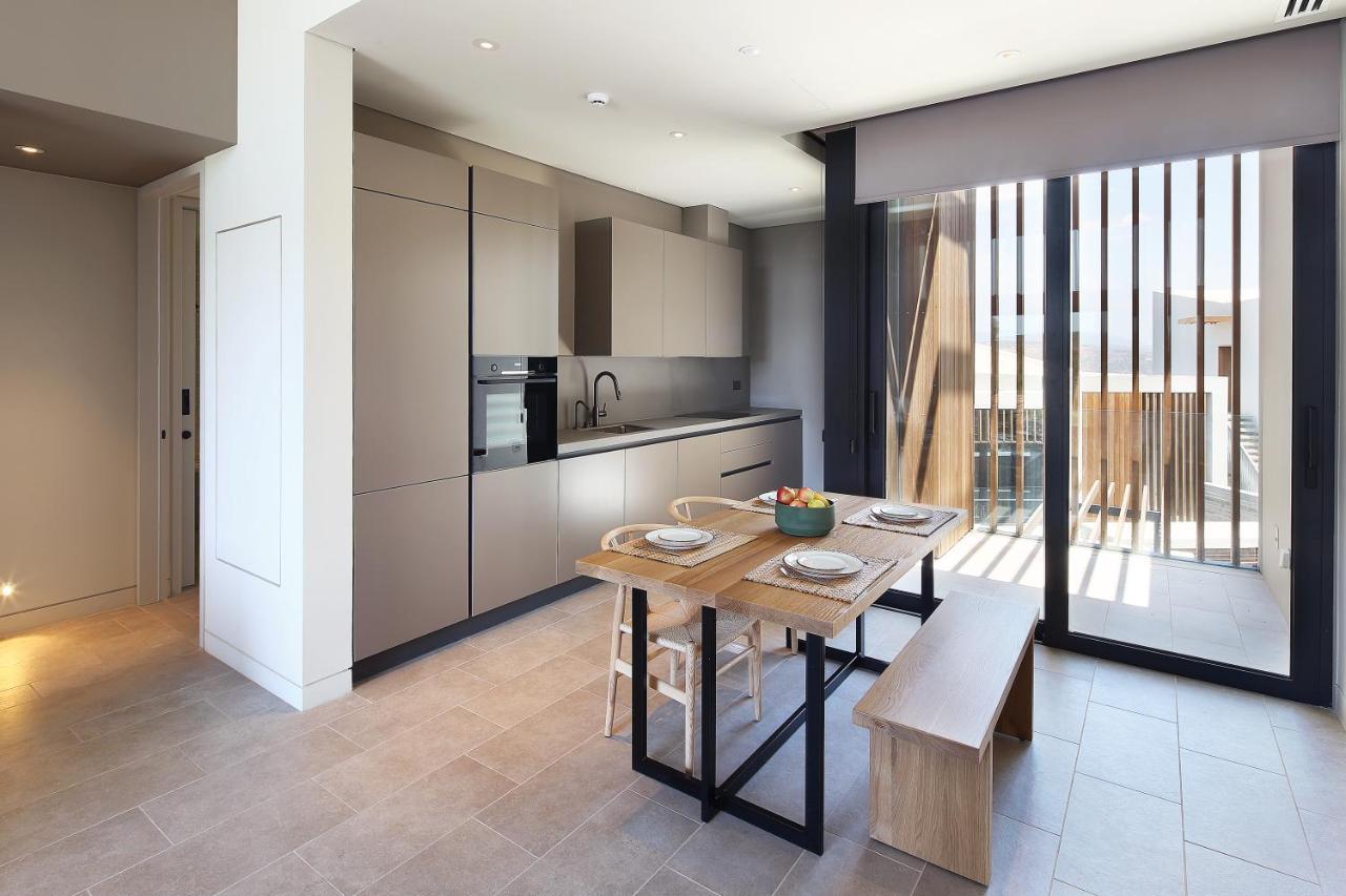 Minthis Resort Tsadha Eksteriør bilde The kitchen and dining area of a typical apartment