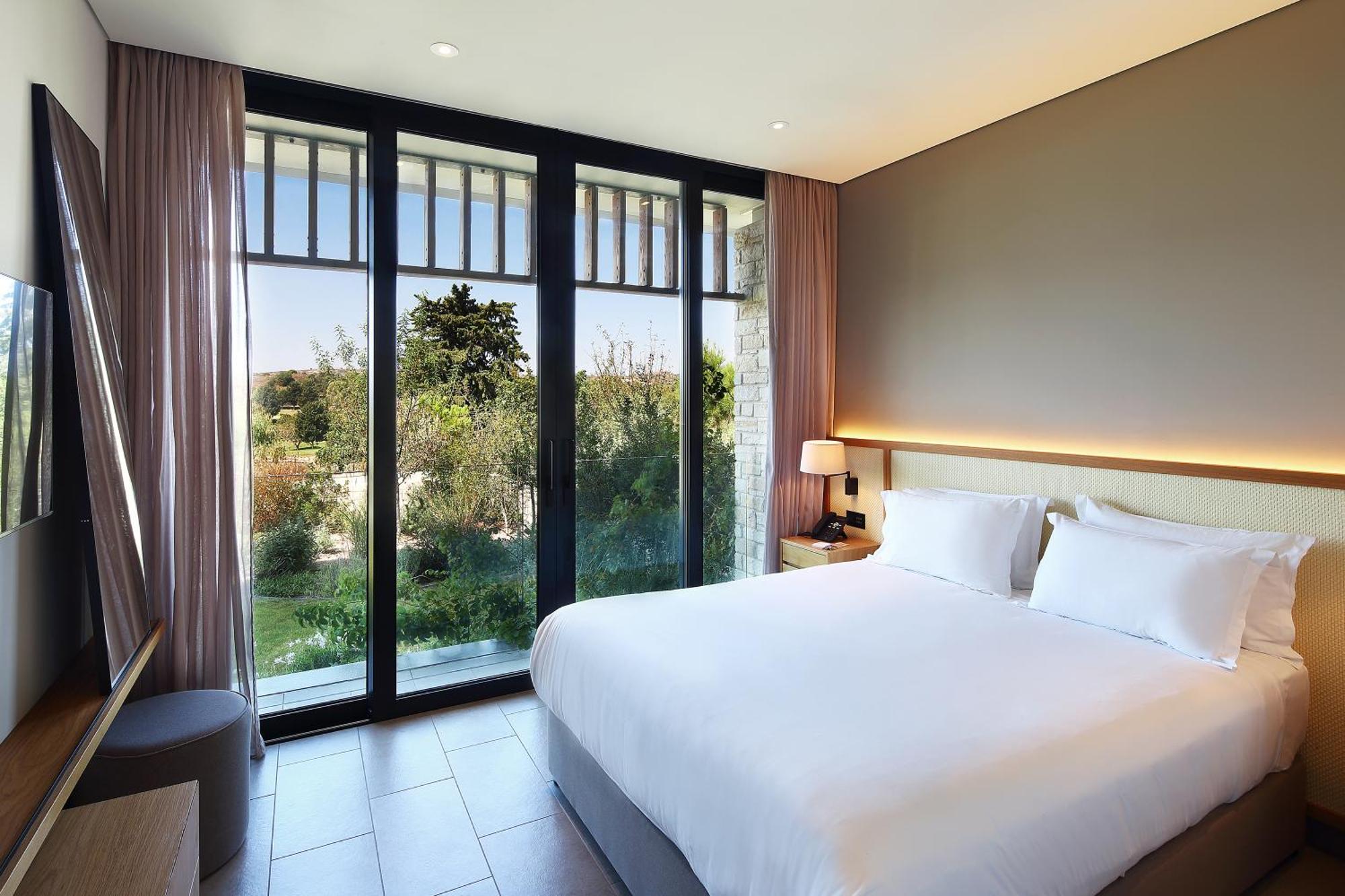 Minthis Resort Tsadha Eksteriør bilde Deluxe Room
